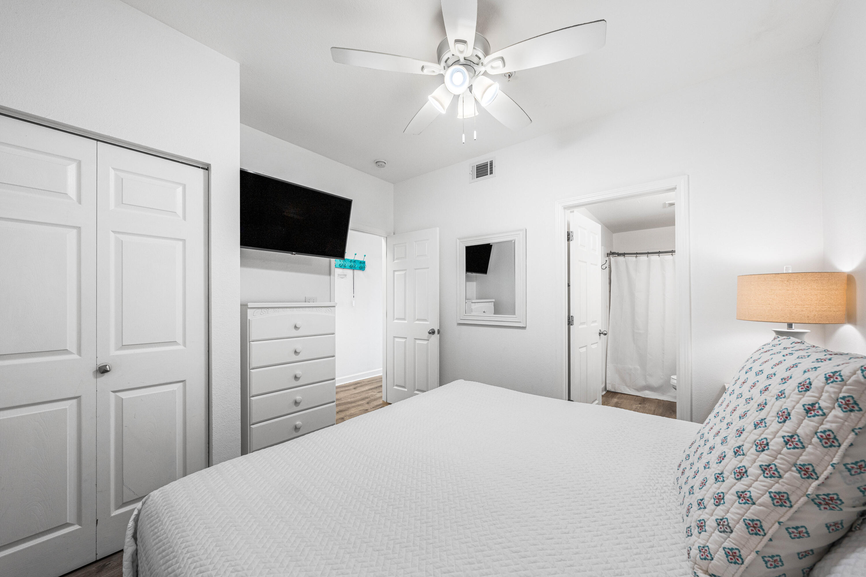 145 Spires Lane, Unit 306 Santa Rosa Beach, FL 32459 - Photo 8 of 35 a bedroom with a bed and a flat screen tv