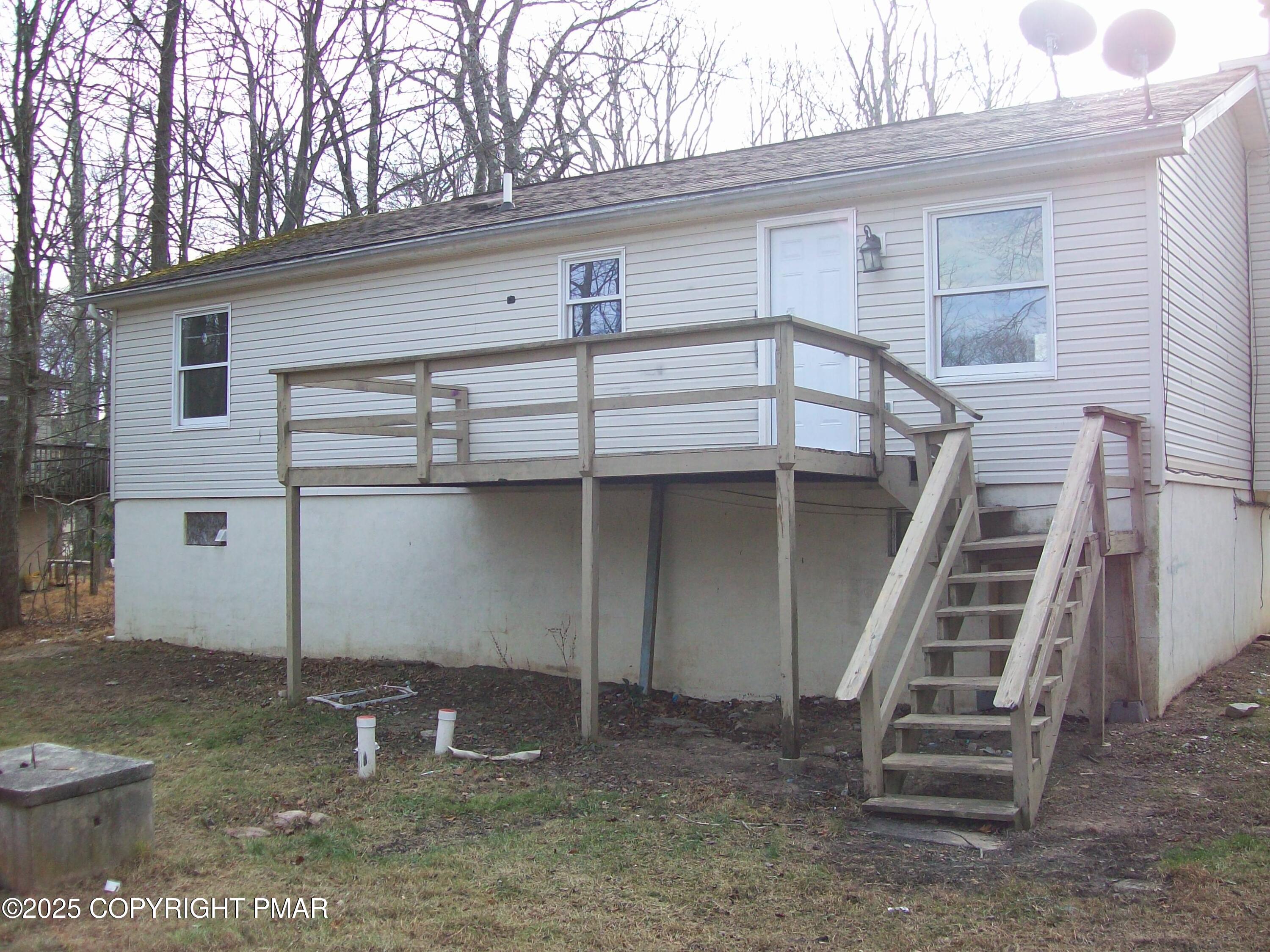 4161 Romeo Road Tobyhanna, PA 18466 - Photo 4 of 25 a front view of a house with stairs