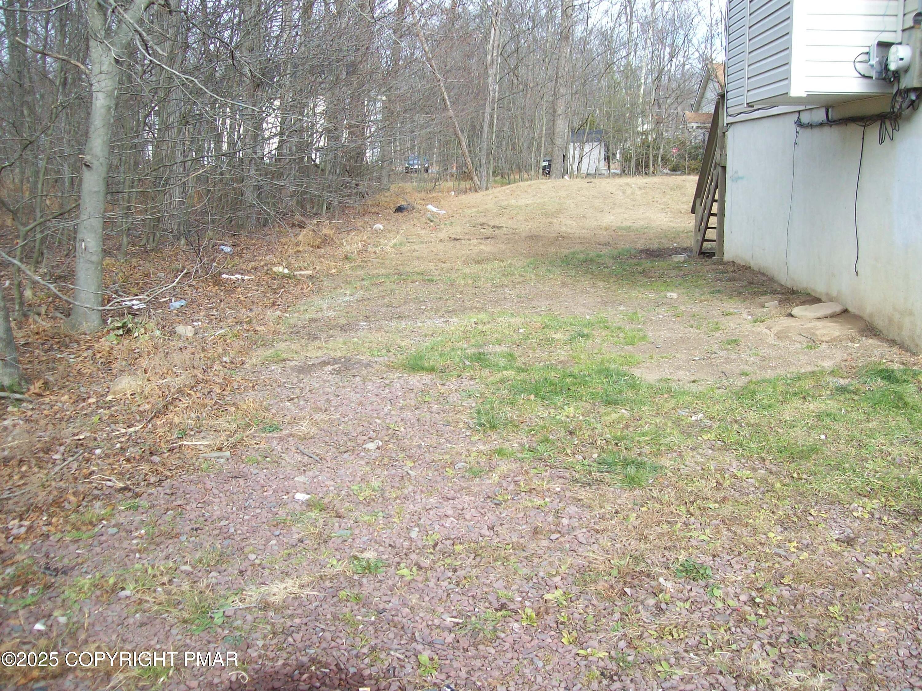4161 Romeo Road Tobyhanna, PA 18466 - Photo 6 of 25 a view of side of a yard with trees