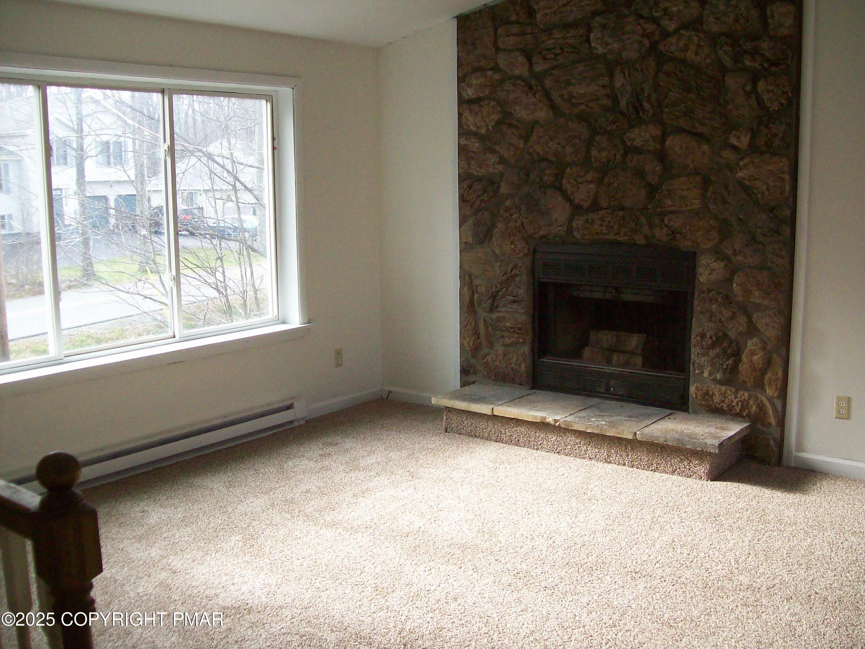 4161 Romeo Road Tobyhanna, PA 18466 - Photo 8 of 25 a view of empty room with a fireplace