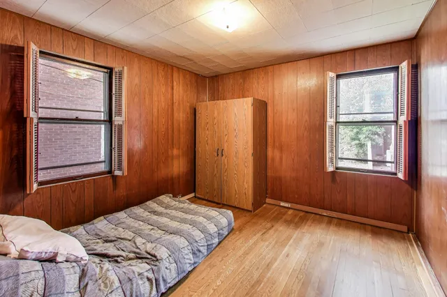a view of a room with a black and white checkered floor