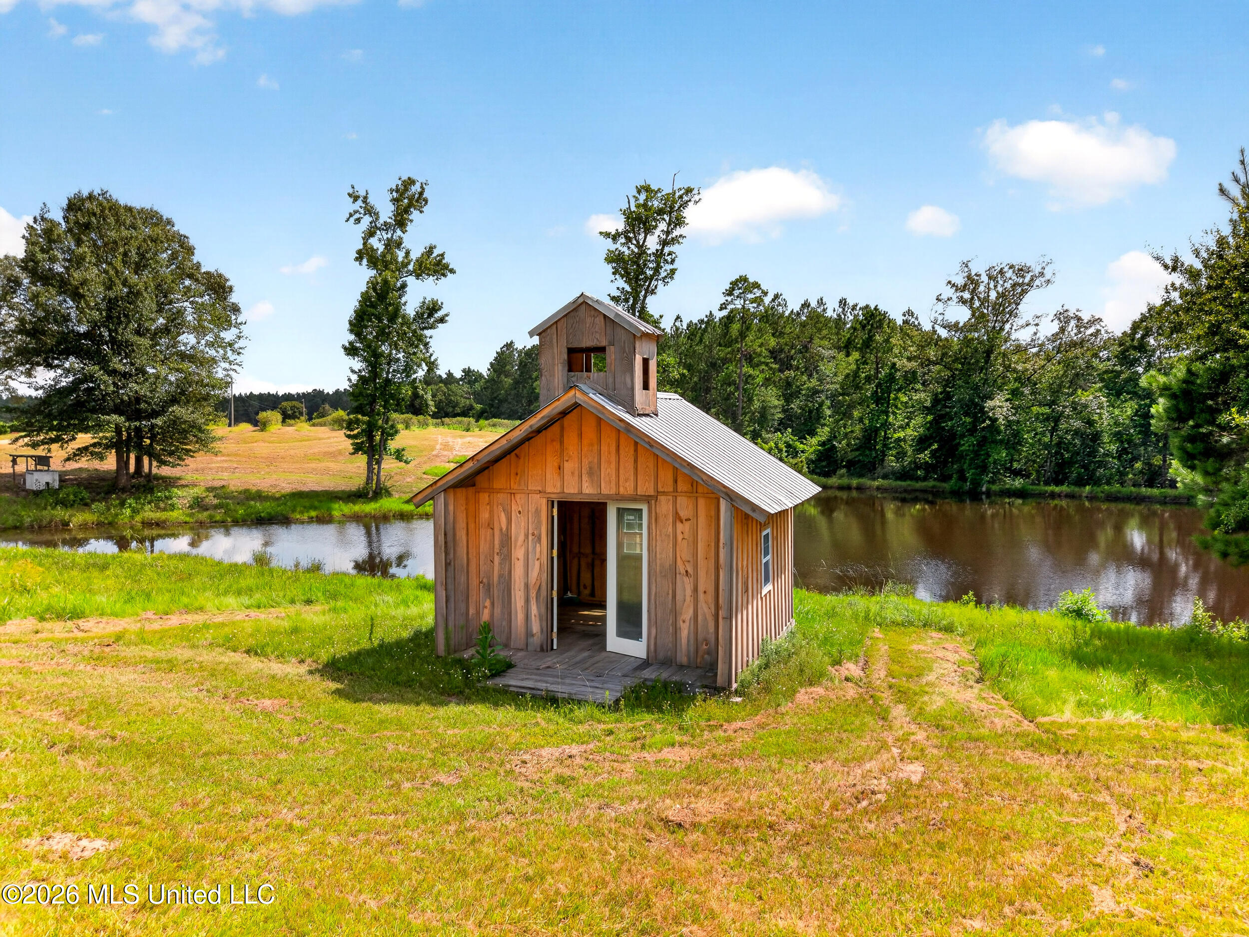 574 Slade Woodward Road Poplarville, MS 39470 - Photo 103 of 106 104_chapel_pond