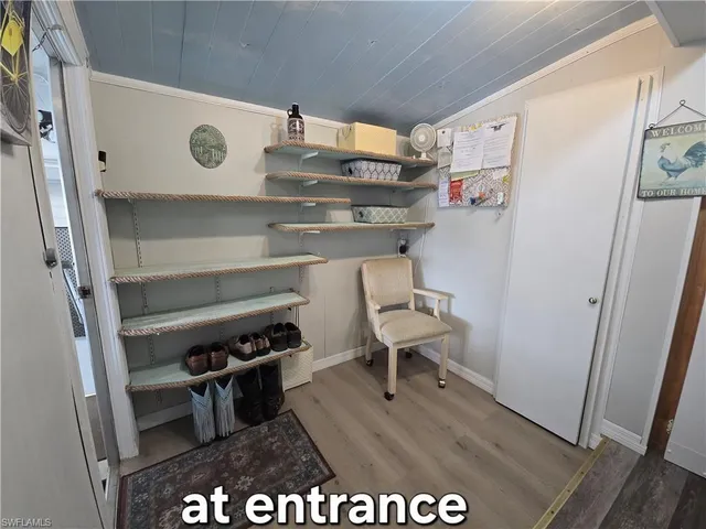 a view of dining room with table and chairs