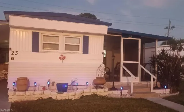 a front view of a house with street