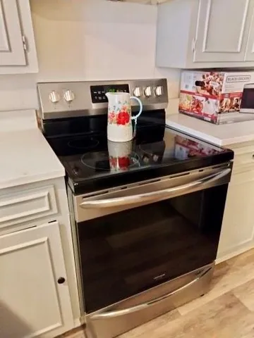 a room with a sink and a mirror