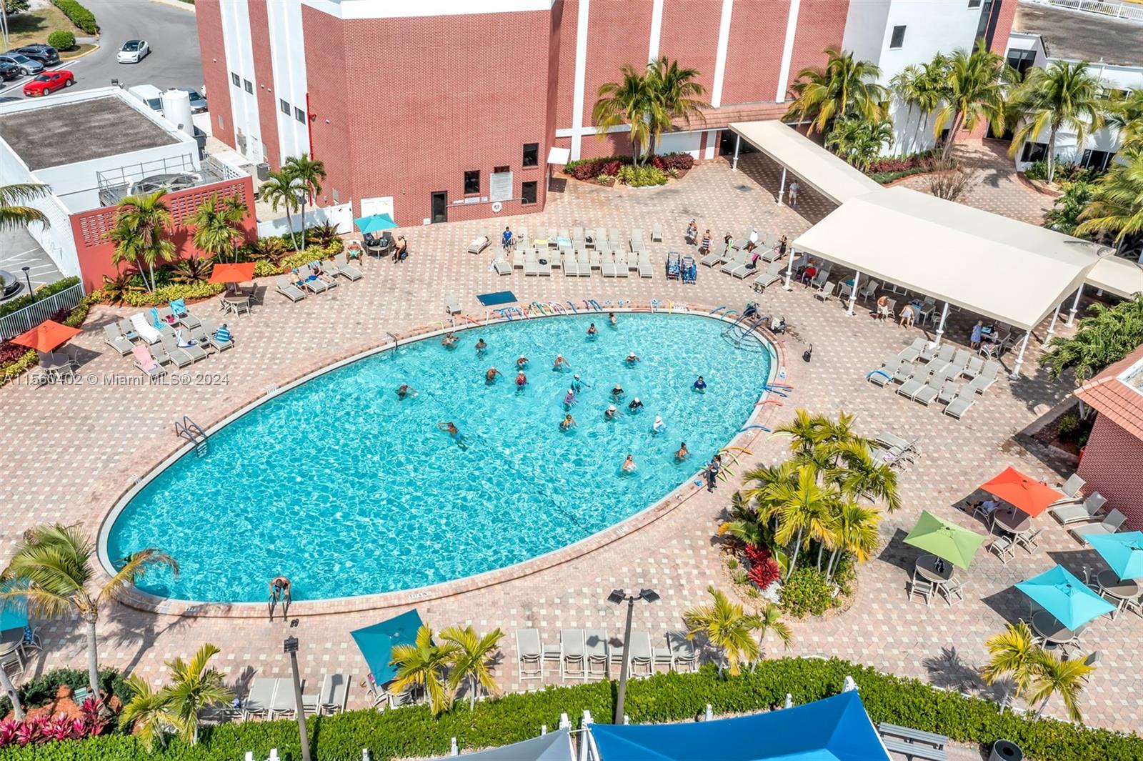 2011 Lyndhurst H, Unit 2011 Deerfield Beach, FL 33442 - Photo 35 of 35 an aerial view of a swimming pool