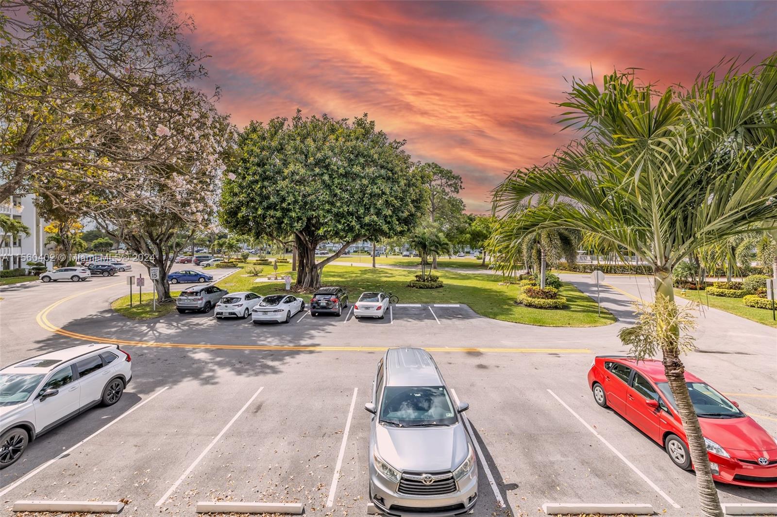 2011 Lyndhurst H, Unit 2011 Deerfield Beach, FL 33442 - Photo 4 of 35 a view of a park with swings and slides