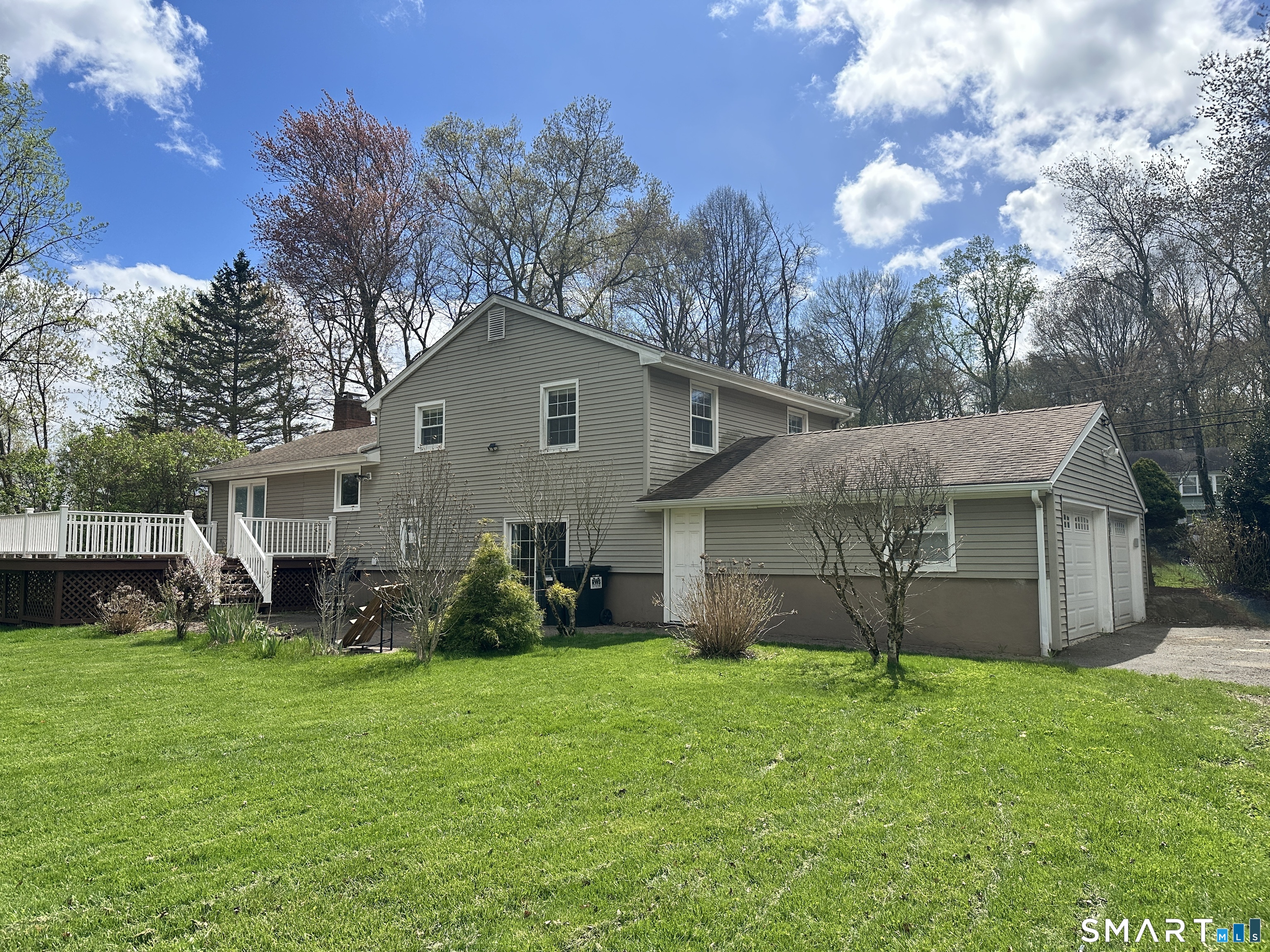 65 Gate Ridge Road Easton, CT 06612 - Photo 15 of 15 a front view of house with yard and green space