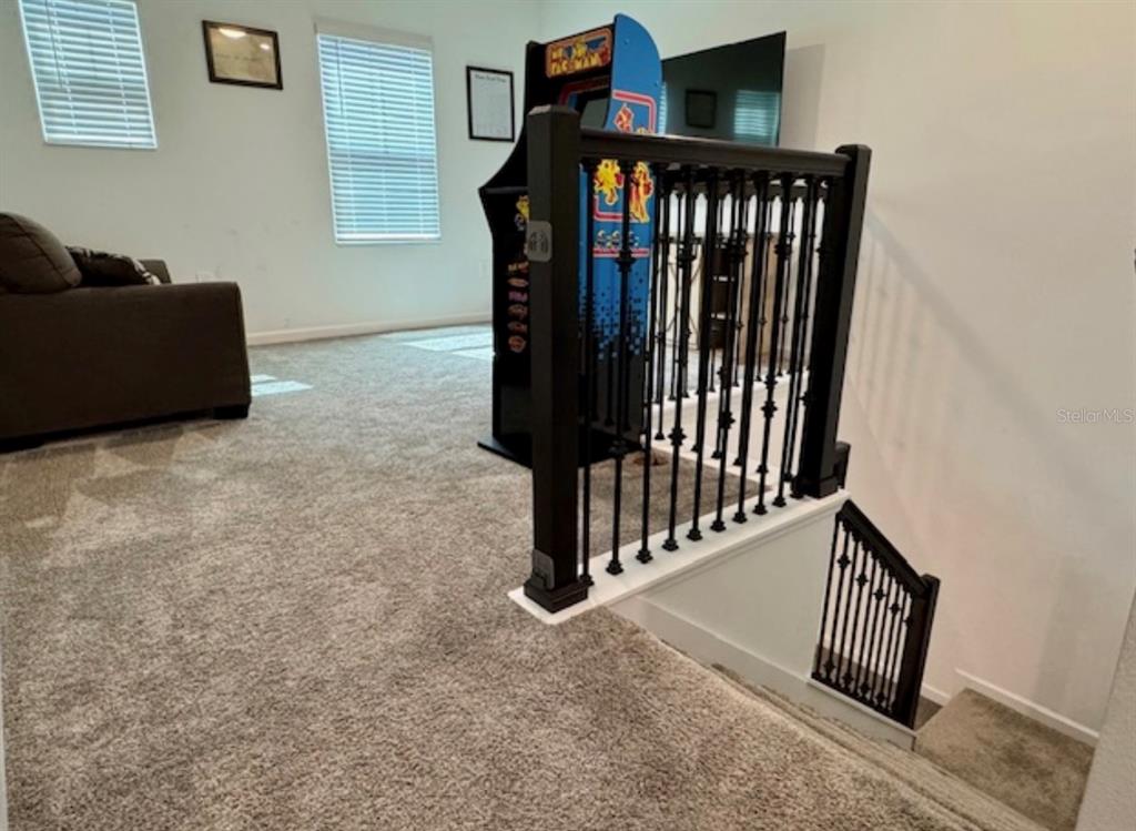 2759 Slash Way St. Cloud, FL 34771 - Photo 18 of 45 a view of staircase with white walls and a window