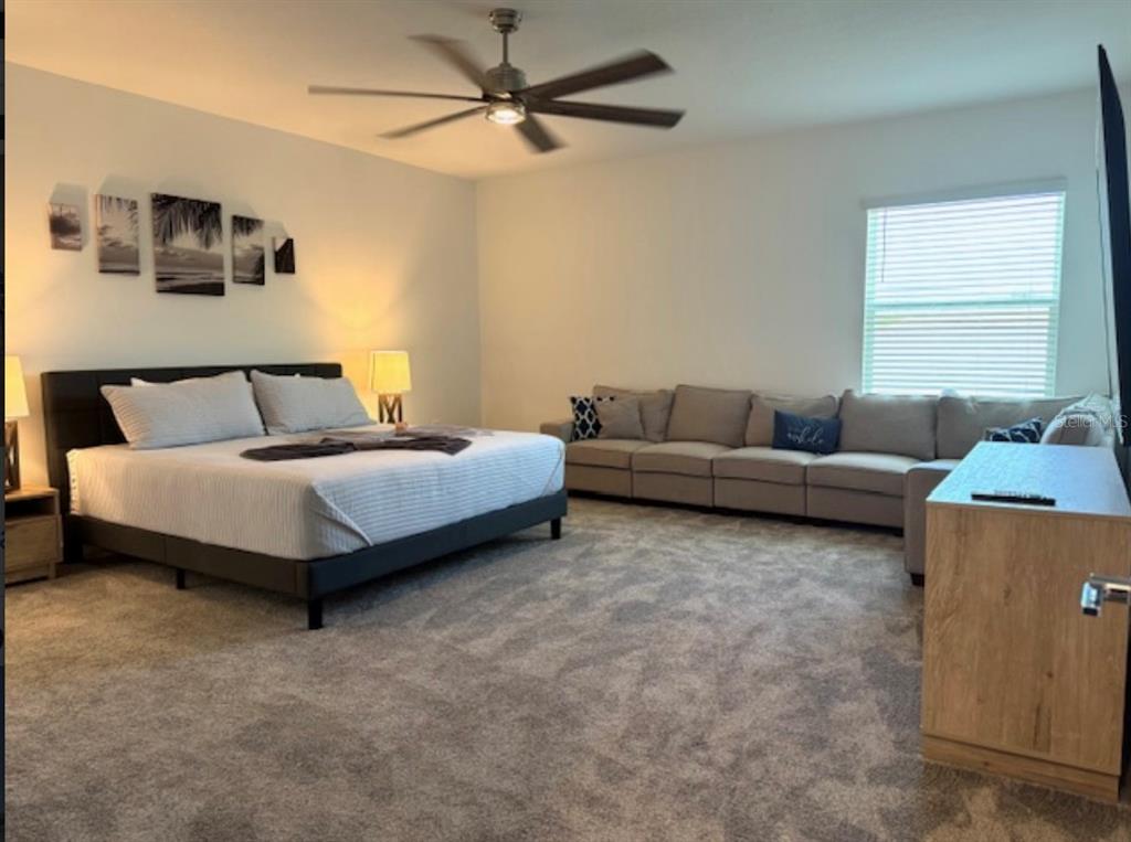 2759 Slash Way St. Cloud, FL 34771 - Photo 20 of 45 a living room with furniture and a window