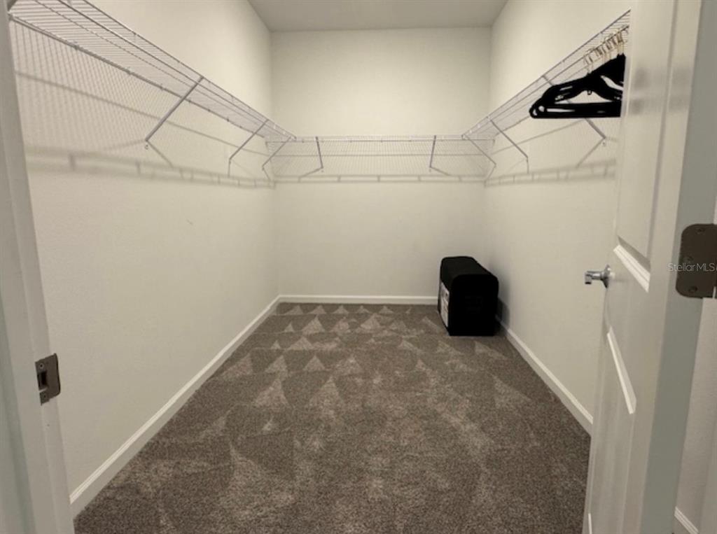 2759 Slash Way St. Cloud, FL 34771 - Photo 25 of 45 a bathroom with a shower