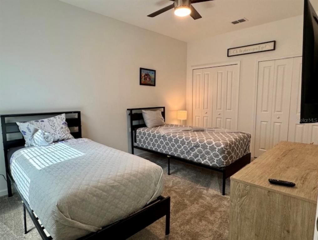 2759 Slash Way St. Cloud, FL 34771 - Photo 28 of 45 a bedroom with a bed and window