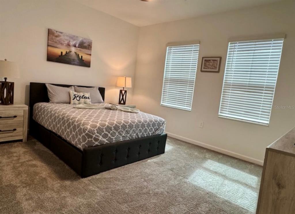 2759 Slash Way St. Cloud, FL 34771 - Photo 33 of 45 a bedroom with a bed and a window