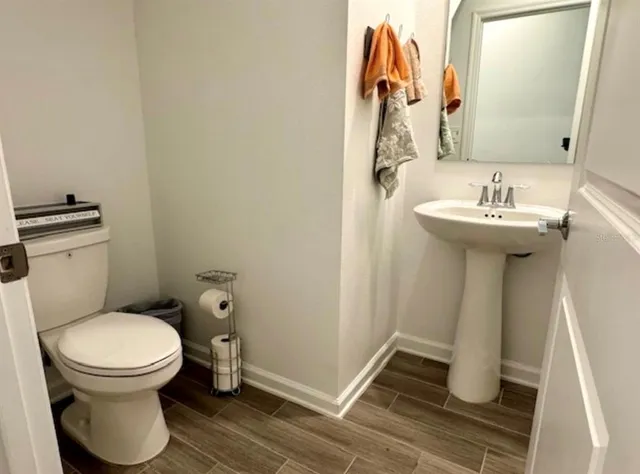 a bathroom with a sink and a toilet
