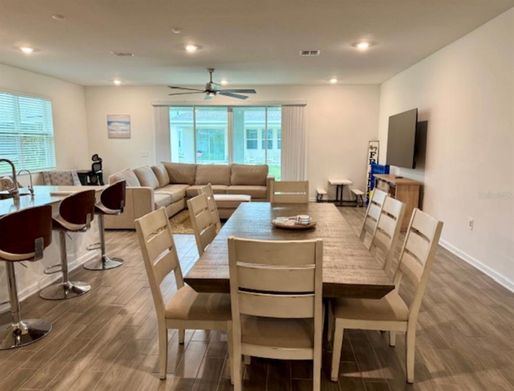 2759 Slash Way St. Cloud, FL 34771 - Photo 4 of 45 a view of a dining room with furniture