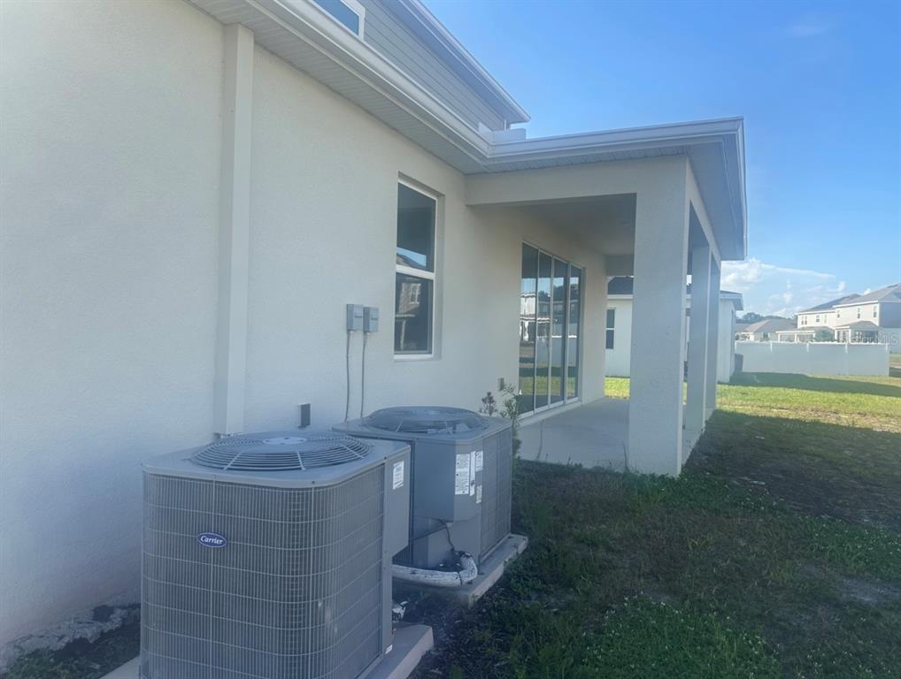 2759 Slash Way St. Cloud, FL 34771 - Photo 42 of 45 a view of spacious bathroom with a sink and mirror
