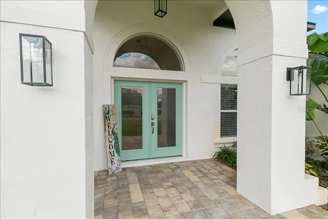 a view of entrance and with wooden floor