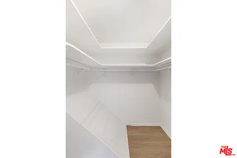 a view of a pathway both side of yard