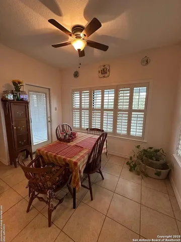 a bed room with a bed and a chandelier