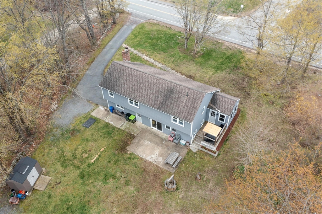101 Williams Road Ashburnham, MA 01430 - Photo 7 of 42 an aerial view of a house with a yard and trees