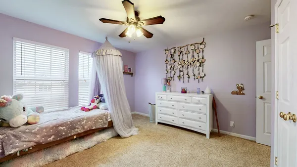 a view of a bathroom with a shower curtain