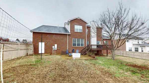 a front view of a house with parking space