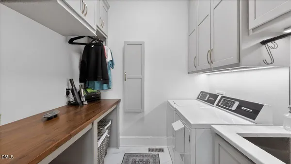 a bathroom with a bathtub and a sink