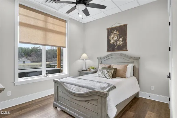 a view of a livingroom with furniture and a garage