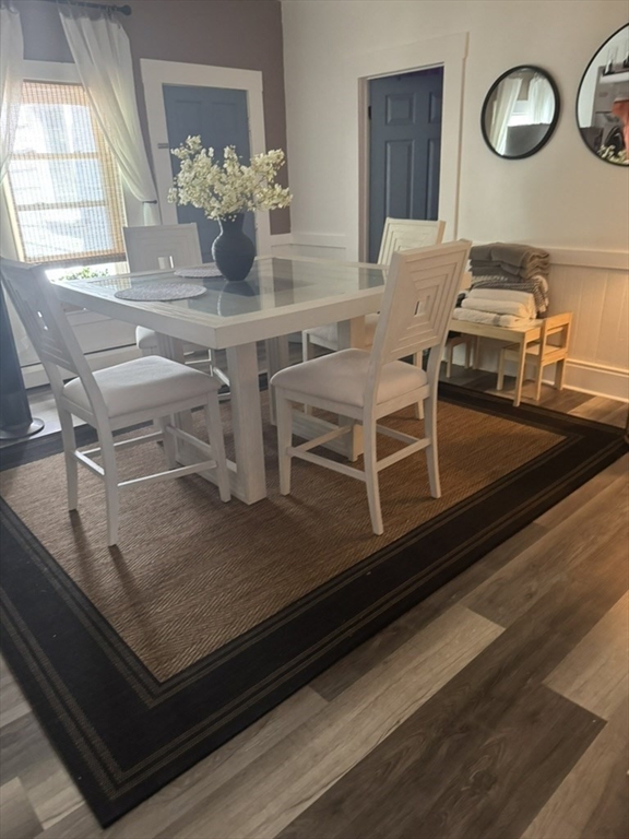 12 Lansdowne Court, Unit 12 Lawrence, MA 01841 - Photo 2 of 5 a view of a dining room with furniture