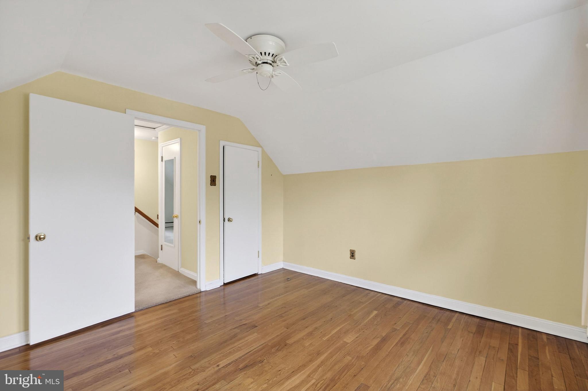 821 Kenyon Lane Newark, DE 19711 - Photo 18 of 50 a view of a room with wooden floor and a ceiling fan