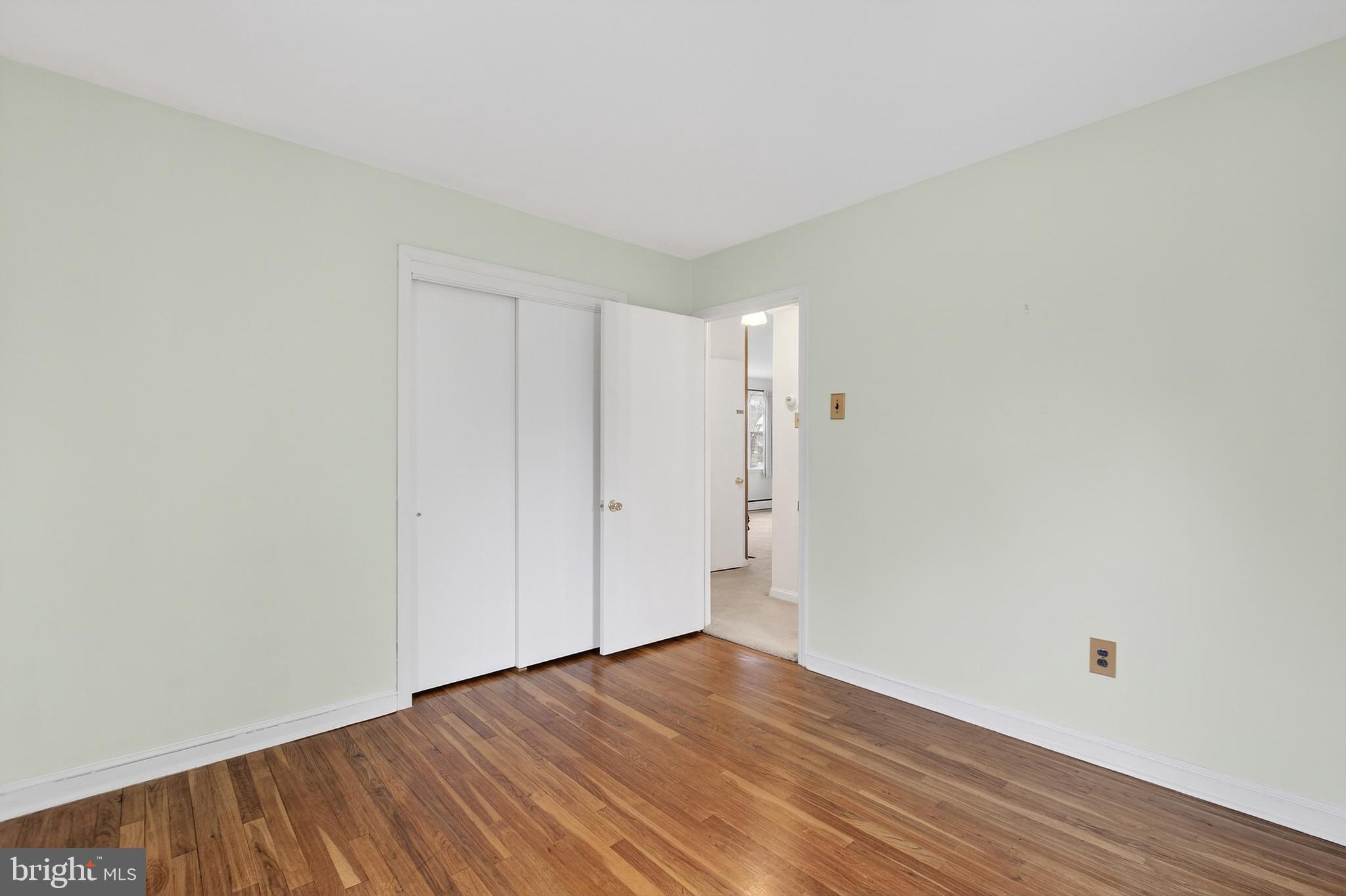 821 Kenyon Lane Newark, DE 19711 - Photo 25 of 50 a view of an empty room with wooden floor