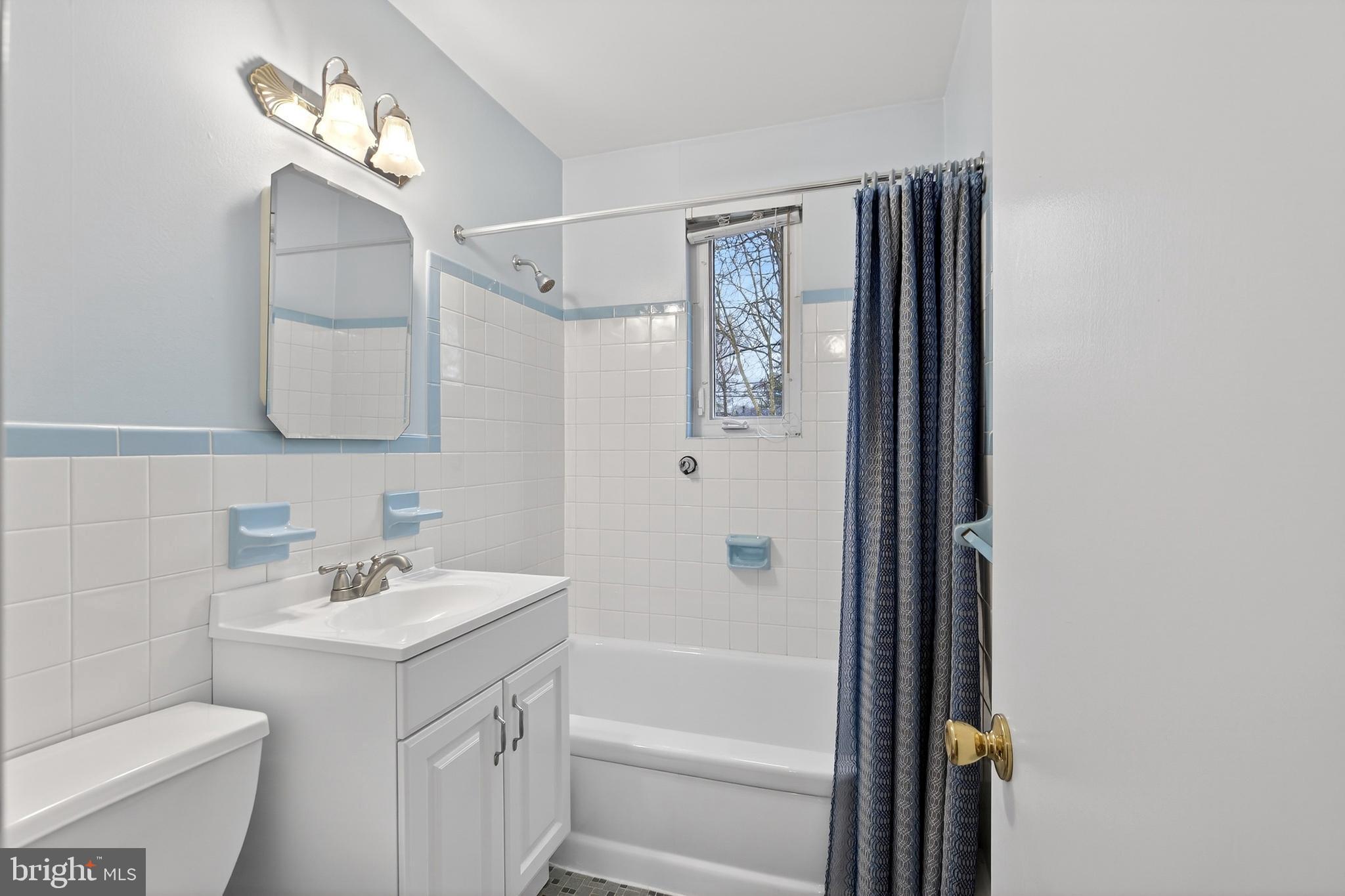 821 Kenyon Lane Newark, DE 19711 - Photo 26 of 50 a bathroom with a sink a toilet and shower