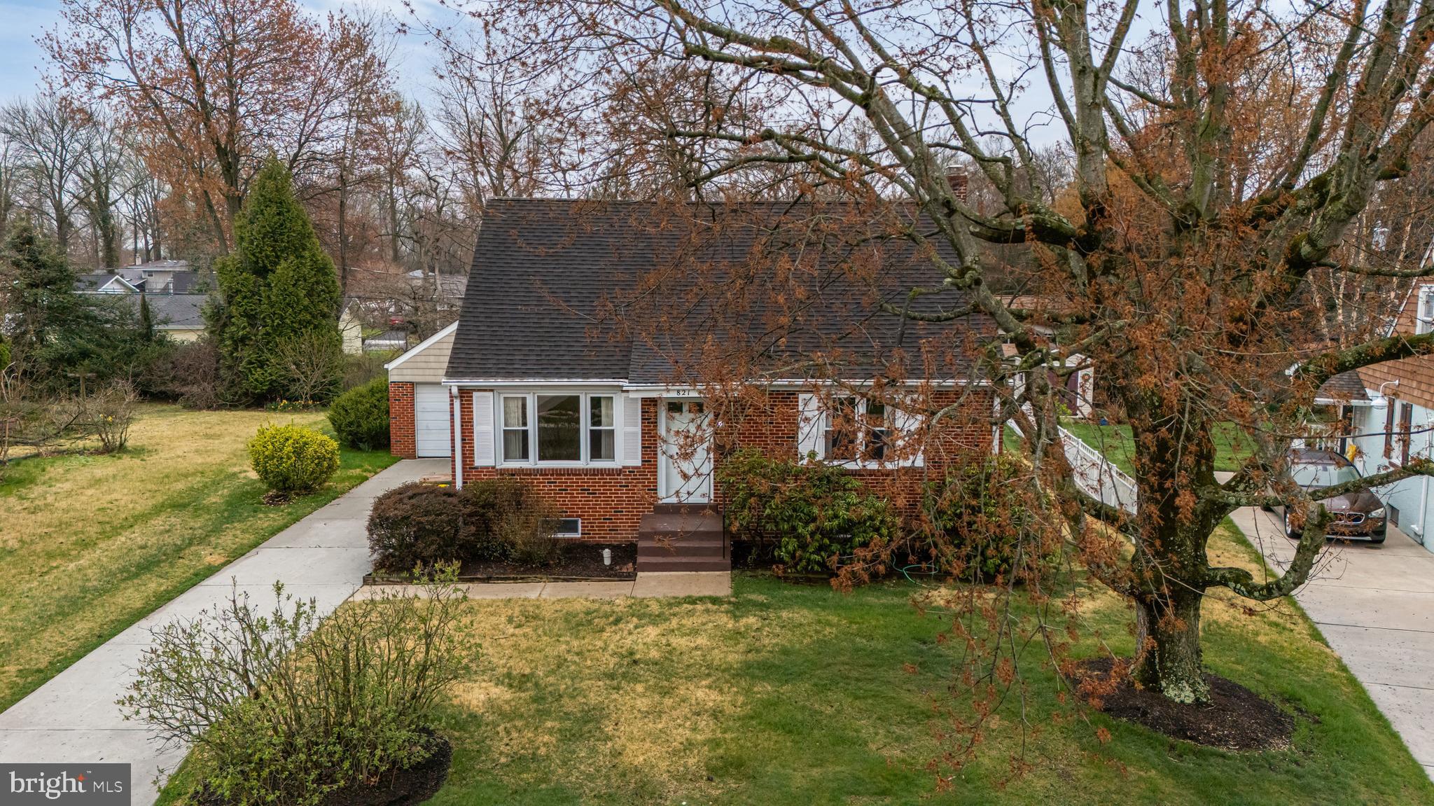 821 Kenyon Lane Newark, DE 19711 - Photo 40 of 50 a front view of house with yard and trees