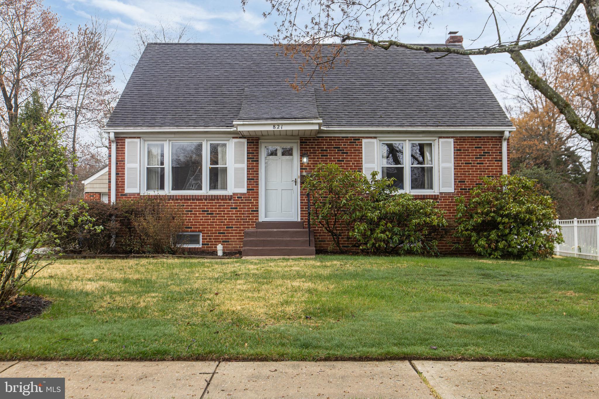 821 Kenyon Lane Newark, DE 19711 - Photo 4 of 50 a front view of a house with a yard