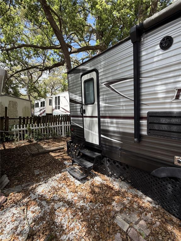 3000 Clarcona Road, Unit 743 Apopka, FL 32703 - Photo 3 of 54 a front view of a house with a yard