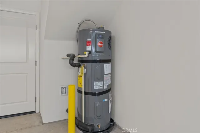 a room with a mirror and a wooden floor