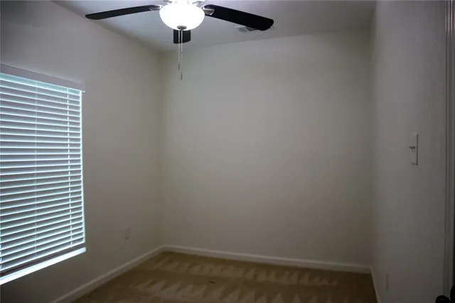 a view of a porch with wooden floor