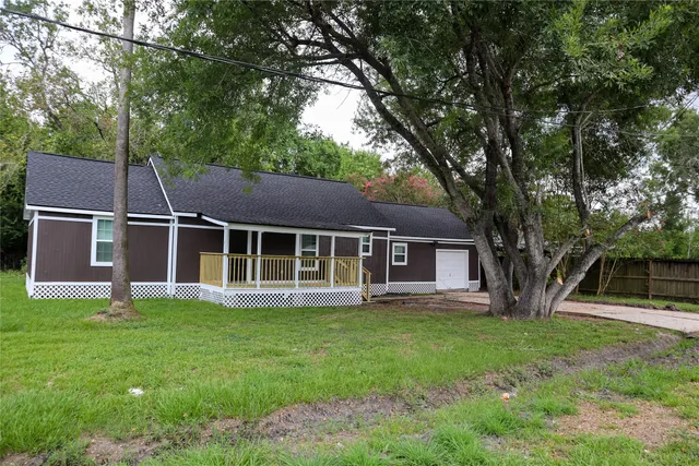 a bathroom with a tub and sink