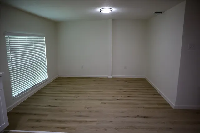 a kitchen with a sink stove and microwave