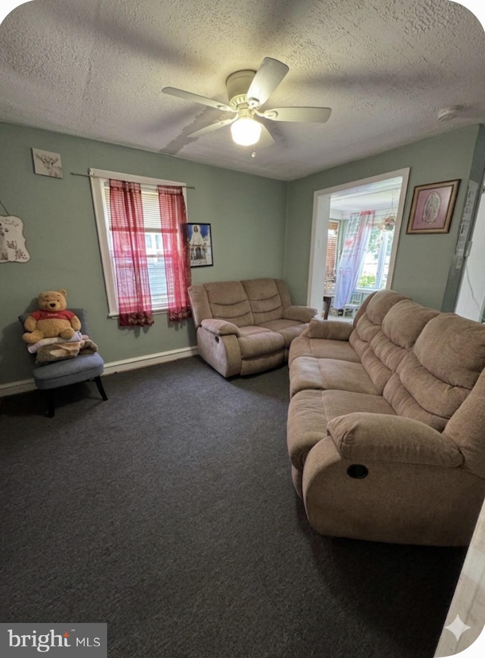 1515 Collings Road Camden, NJ 08104 - Photo 10 of 23 a living room with furniture and a window