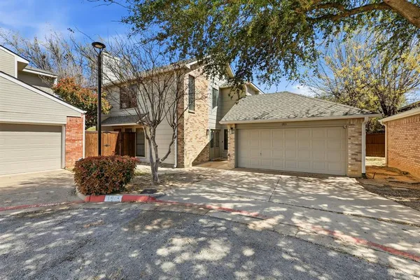 a house with yard in front of it