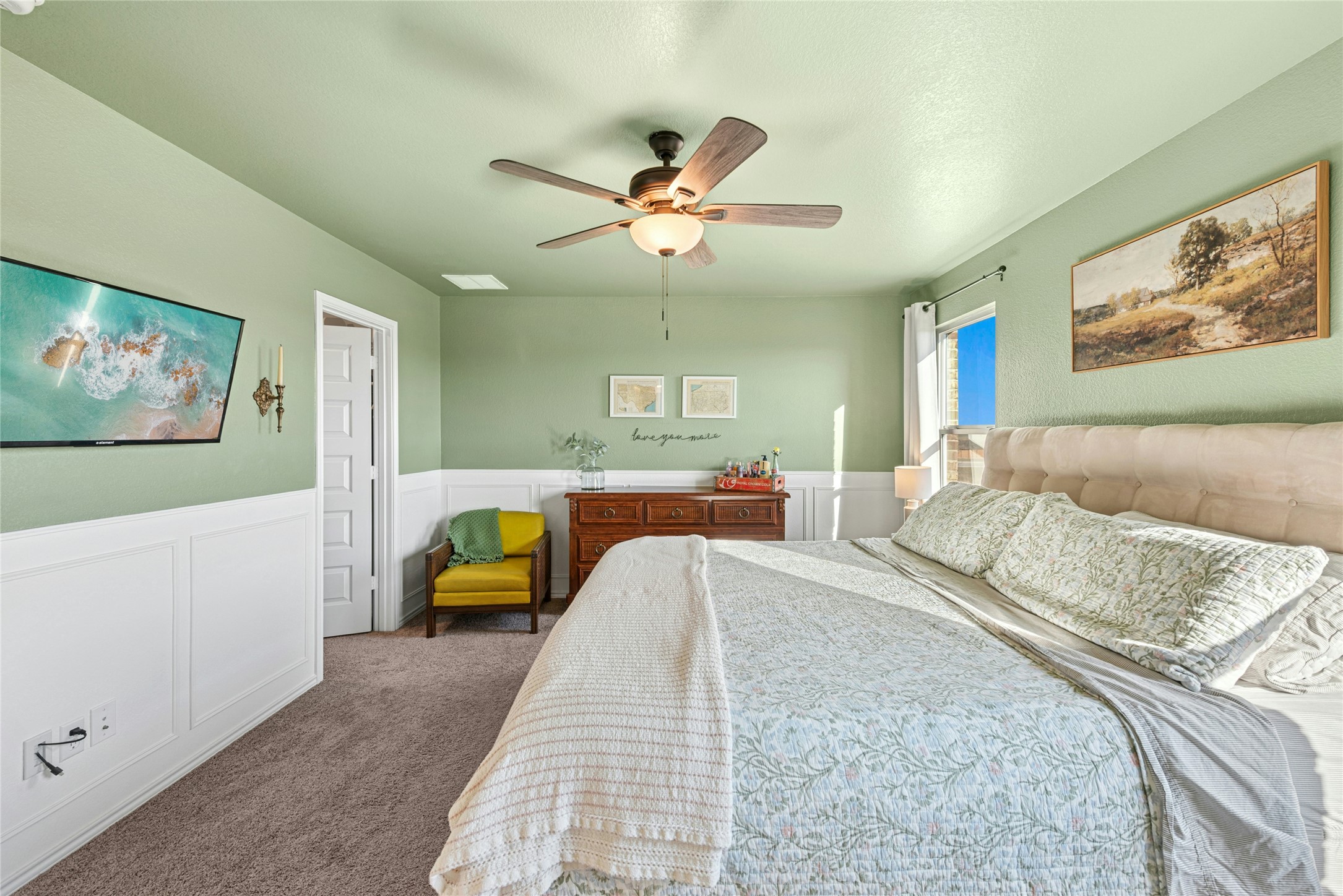 2001 Saskatoon Street Georgetown, TX 78626 - Photo 24 of 40 Bedroom with wainscoting, a decorative wall, carpet, and ceiling fan