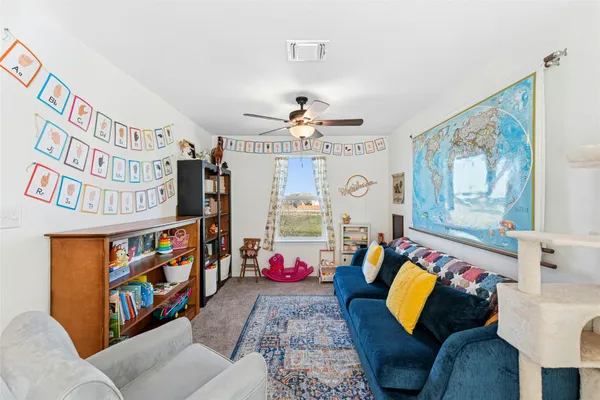 a view of a living room and a couch