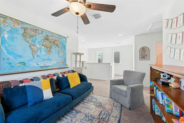 a living room with furniture and a couch