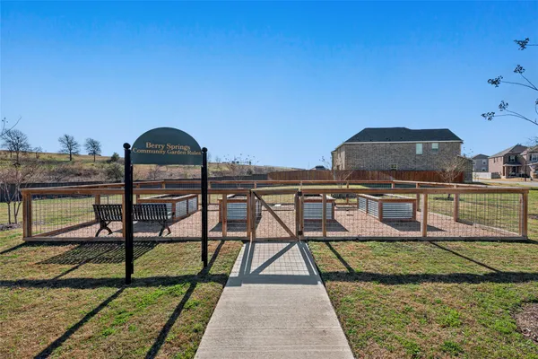 a view of a swimming pool with a lounge chairs