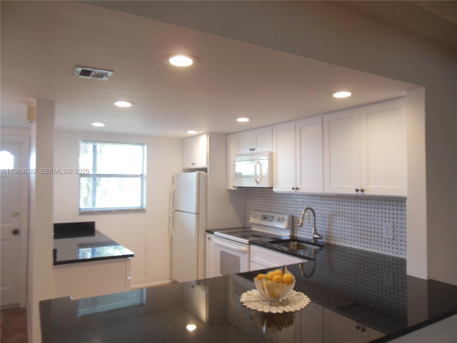 10110 Boca Entrada Boulevard, Unit 402 Boca Raton, FL 33428 - Photo 4 of 29