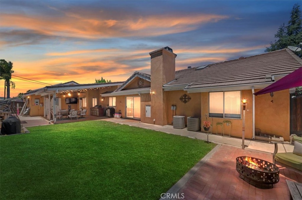 7245 Marilyn Drive Corona, CA 92881 - Photo 10 of 68 a front view of a house with garden