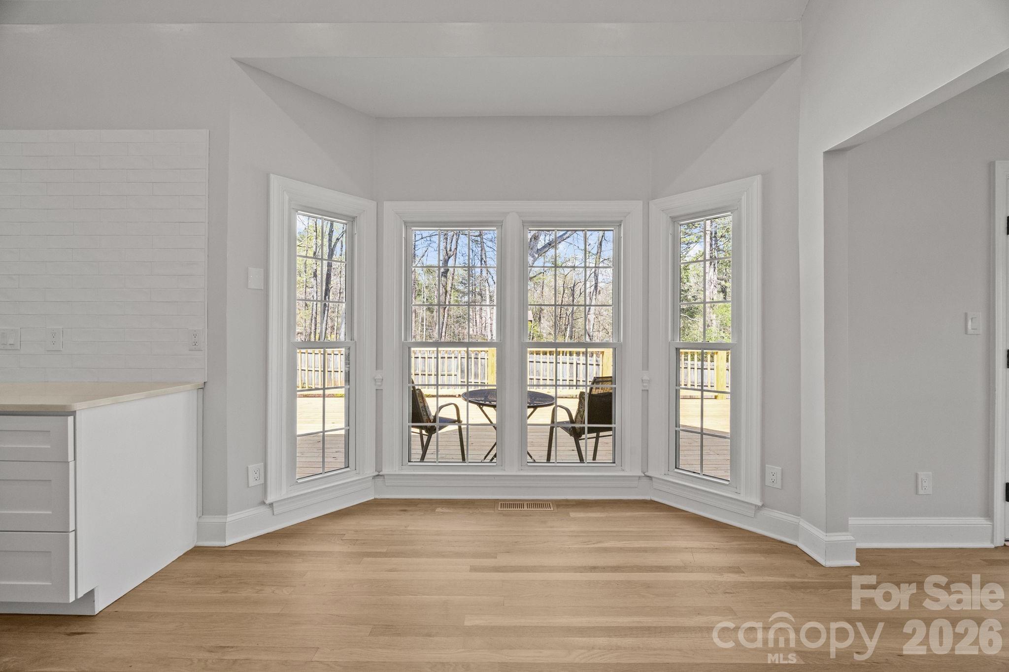 5243 Mintridge Road Mint Hill, NC 28227 - Photo 16 of 43 a view of an empty room with glass door