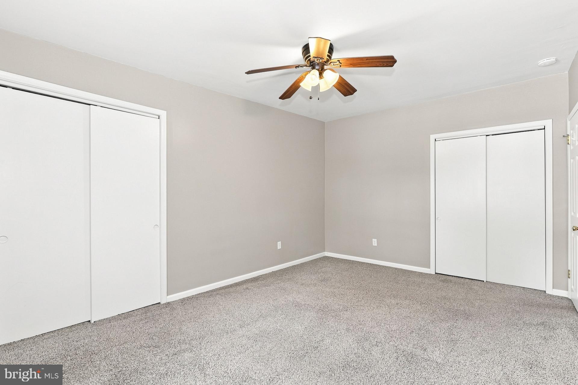 1007 Fairview Road, Unit D Swarthmore, PA 19081 - Photo 10 of 15 Spacious room with modern ceiling fan.