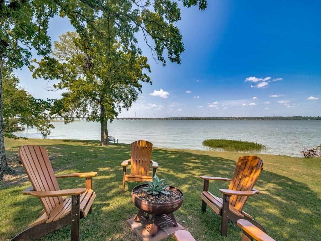 9981 Waterfront Trail Rowlett, TX 75087 - Photo 26 of 26 View of green lawn with a water view